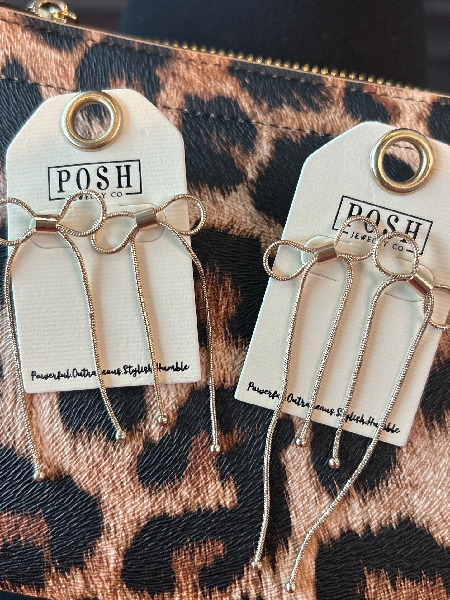 Gold snake bow earrings