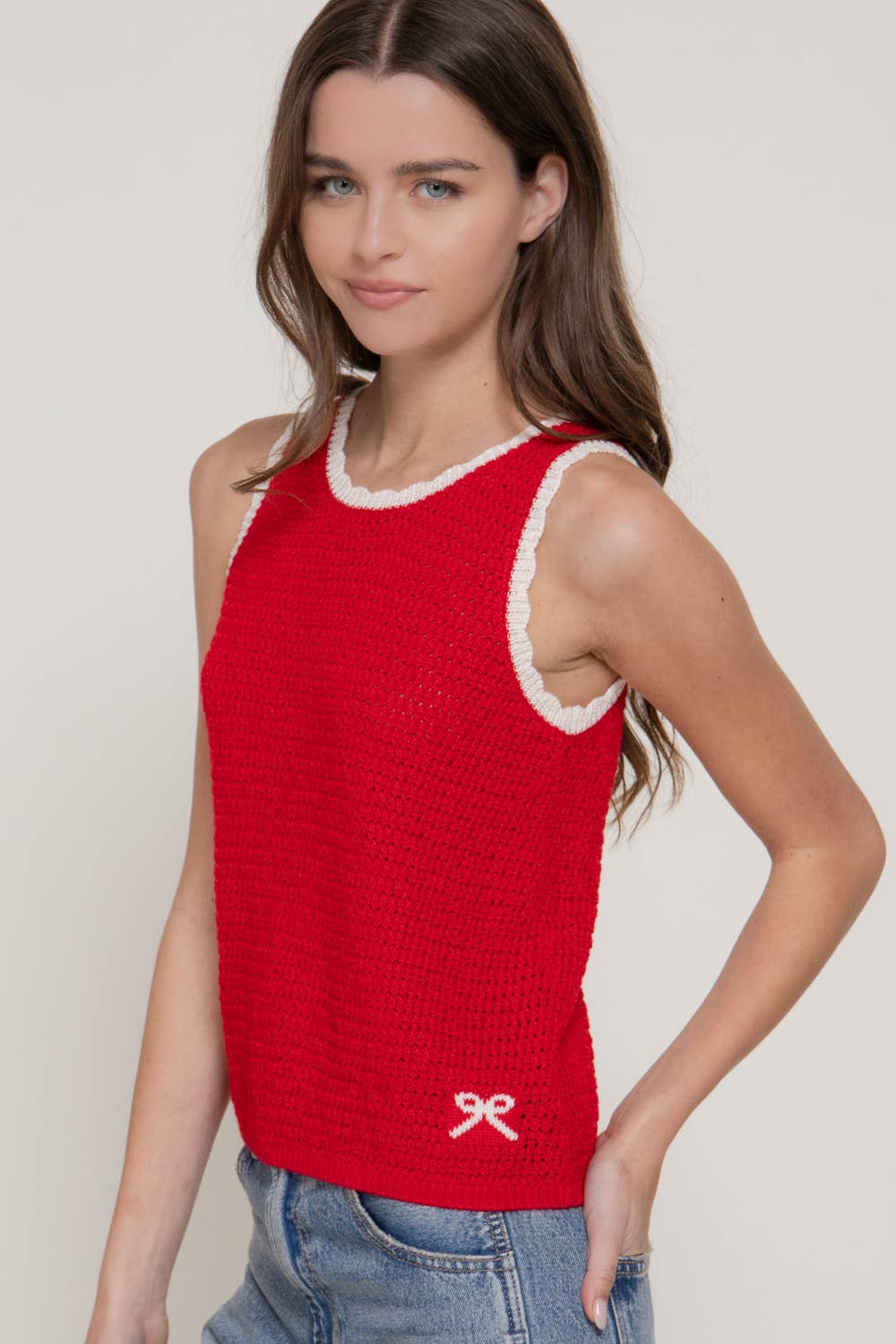 Sleeveless Sweater with Contrasting Edges & Jacquard Detail