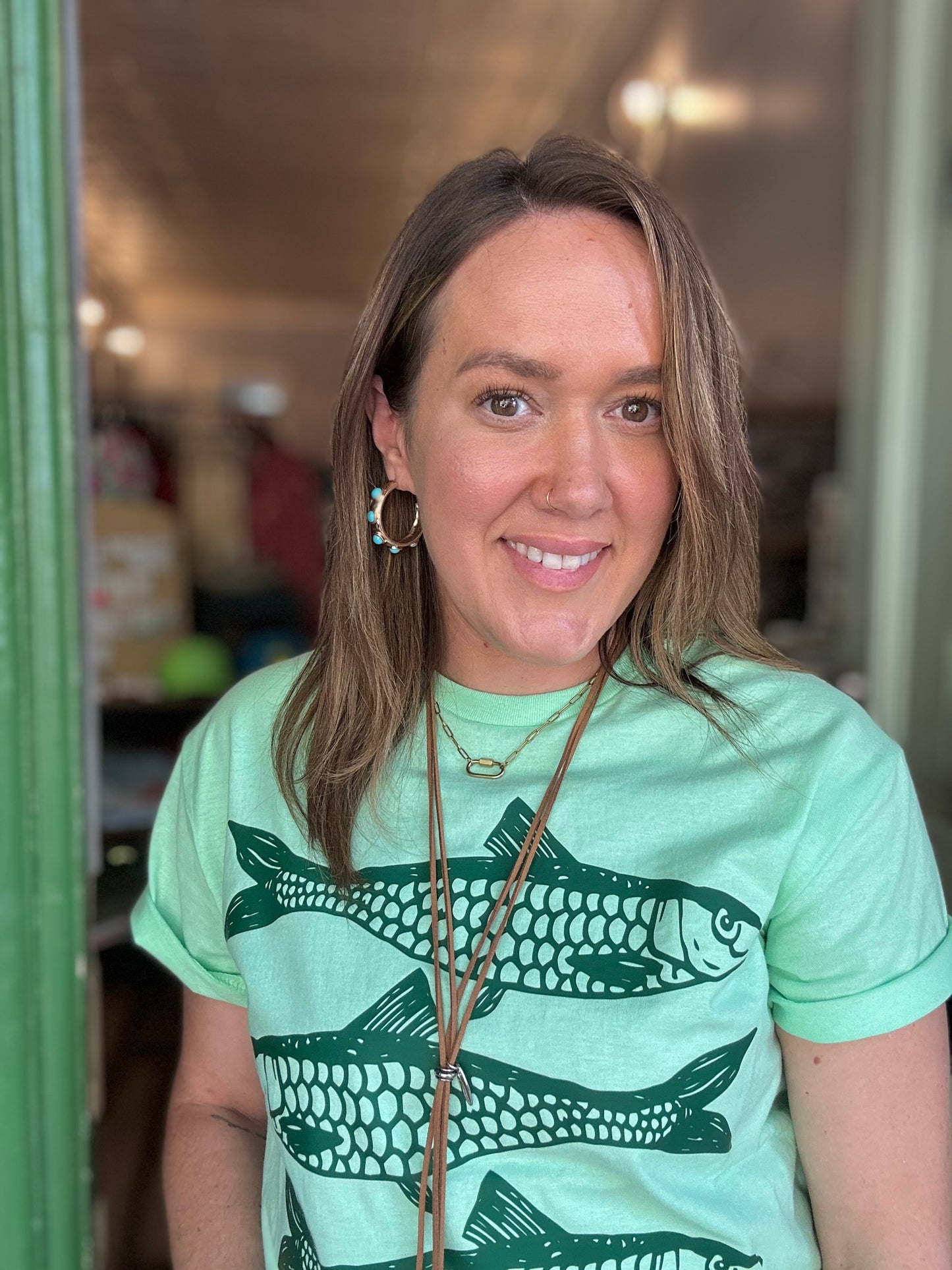 Green fish tee