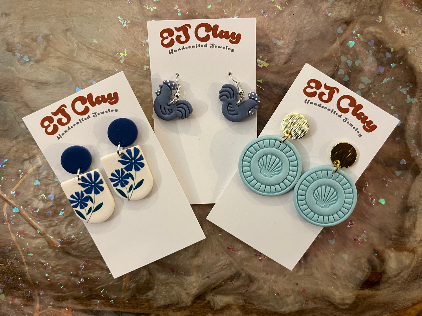 Blue ej clay earrings